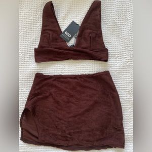 Brand new Ego mini bodycon skirt and matching V-dip bralette top